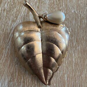 Vtg Avon Elusive Glace perfume in gold tone travel compact leaf shape case